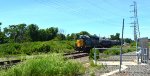 CSX 4451 with four tank cars.